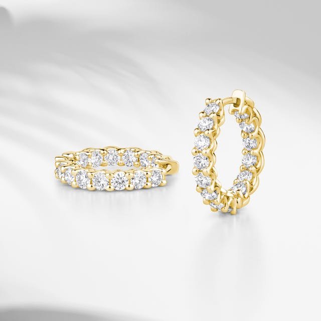 Entre lumière et élégance : l’art des boucles d’oreilles en diamant